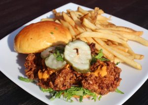 Fried Chicken Sandwich with American Cheese, Pickles and French Fries